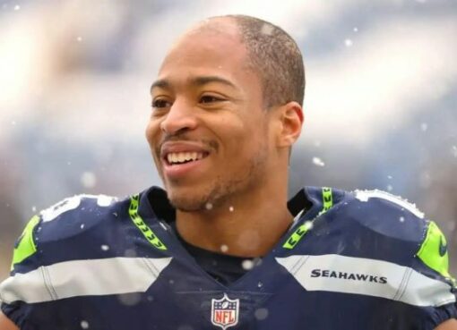 Lockett was born in the month in 1992 in Tulsa, Oklahoma, United States of America. Thirty years old American footballer celebrates his birthday every year on September 28. The wide receiver first appeared in the National Football league in 2015 A.D. The star Player has performed excellently every season since his first appearance in NPL. He has won several awards for exemplary performance in the game, such as Seattle Sports Star of the year (2021), Steve Largent Award Winner,  Emmy award, Walter Payton Man of the Year Award, and much more.  He finished the National Football League Season (2021) as the leading receiver with 57 receptions; hence on April 2, 2021, Tyler signed a $69.2 million contract extension with $37 million with the Seahawks on April 2, 2021. Is Tyler Lockett Christian? His Religion Explored  There has been a talk in the town about the famous American Footballer Religion; however, we have unfolded the mysteries about the start of footballer religion. Tyler Lockett is a Christian by birth, and he follows Christianity. The Popular player has not made any statements on his religion on any public media or platform; however, he was seen going to churches on several occasions. Therefore It states that Tyler has faith in Jesus Christ and Christianity. He often wears cross lockets during the game periods and outside the game. People believe that he wears The Cross locket to perform well in the game, and Guess what? – He has managed to deliver his best performance whenever he steps into the field. He finishes the National Football League Season (2021) as the leading receiver with 57 receptions; hence Tyler signed a $69.2 million contract extension with $37 million with the Seahawks on April 2, 2021. Tyler Lockett Family And Ethnicity Tyler’s father’s name is Kevin Lockett, whereas his mother is Nicole Edwards. Yes, you have heard it right. The famous American Football star Tyler Lockett’s father was a full-time wide-range receiver who played between 1993 to 1996 for Kansas State.  Tyler’s Father, Kevin Lockett, also played for the Kansas City Chiefs in National Football League. Kevin was the all-time leading receiver at the school-level game.  The star Footballer’s mother, Nicole Edwards, was a Sprinter with sheer tenacity.  Tyler Lockett is the eldest son of his family. He is more senior to the twin brother Jacob and Jordan Lockett.  The American Footballer’s grandparents, John Lockett and Beatrice Lockett were petroleum engineers; however, John was also involved in sports. John Lockett was also a sportsman who played basketball at Saint Augustine University. It is described that Tyler Lockett’s grandfather John Lockett played basketball on a Scholarship.  On the other hand, famous sportsman Tyler Lockett’s uncle- Aron Lockett, played at K-State. Aron was the fourth all-time leading receiver and Second all-time leading punt returner. He played for K- State from 1998-2001.  It appears that The Lockett family members are sportsmen by nature. The majority of the Lockett family members selected careers in sports and athletics. The athletic family’s ethnicity is Black, and it is assumed that they moved from Africa to America. Tyler Lockett Net Worth: According to wealthy Gorilla, the net worth of Tyler Lockett is around $ 11 Million. As per acknowledge, The Star footballer wide receiver’s monthly income is $0.1 million, whereas the monthly salary is $2 Million.  Lockett’s source of income includes Football Contract, brand endorsement, Real estate, and bonuses from the club team. Seattle Seahawks